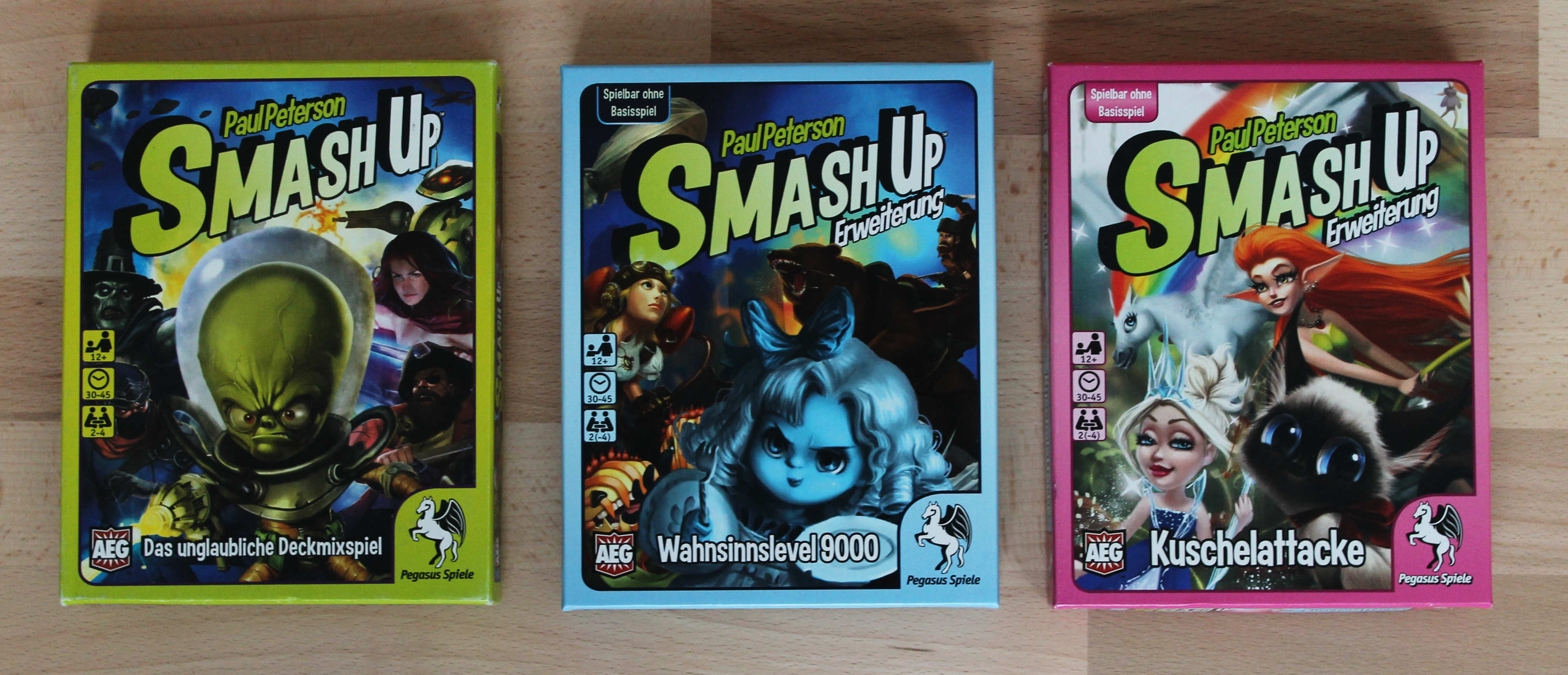 Abb.: Smash Up (2012), Spiel und Erweiterungen. Quelle: Eigene Abb.